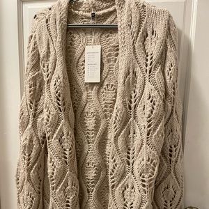 Tan cardigan super comfortable dress up or down. New with tags